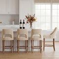 Four Beige Wood Leg Upholstered Bar Stools