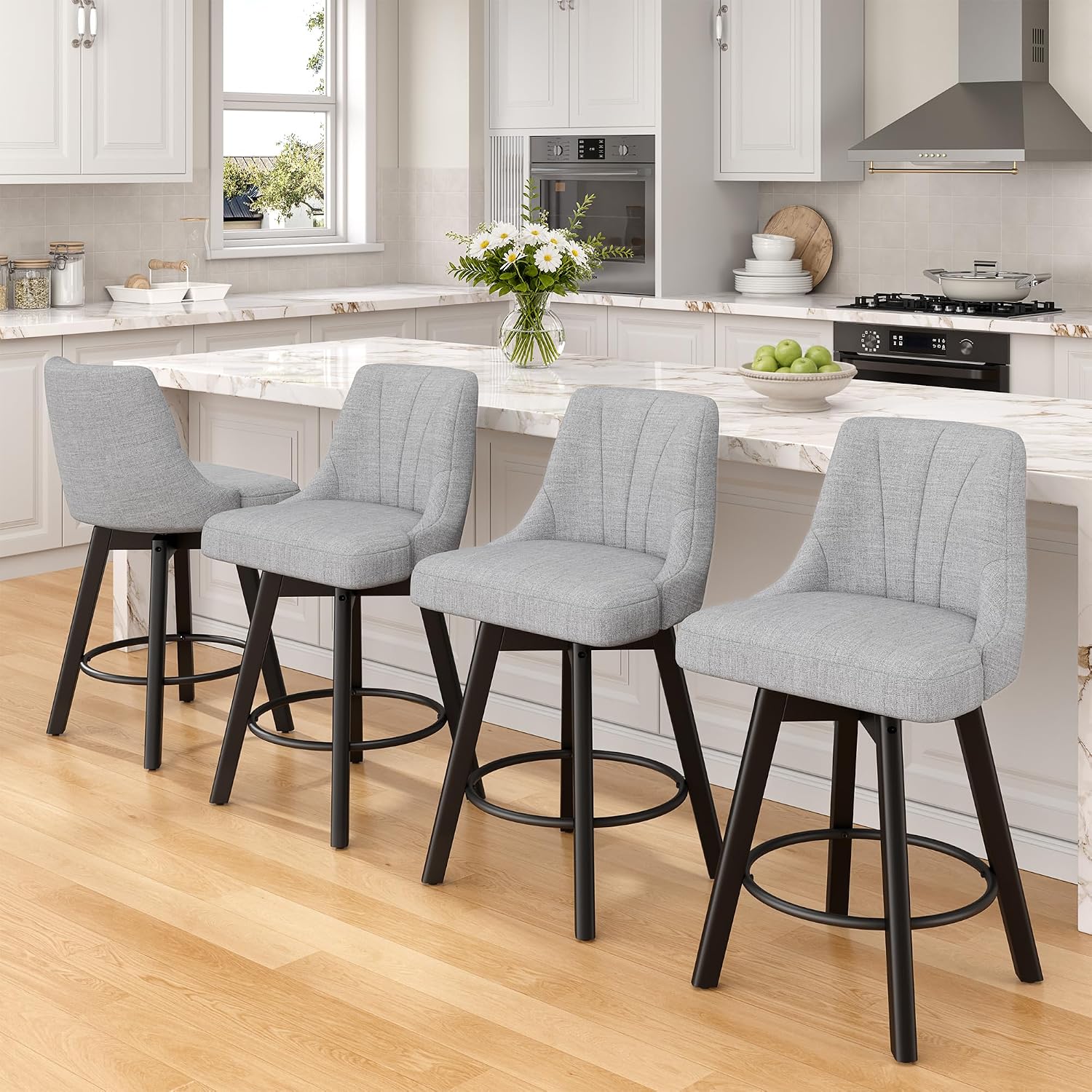 Four Gray Fabric Swivel Counter Stools